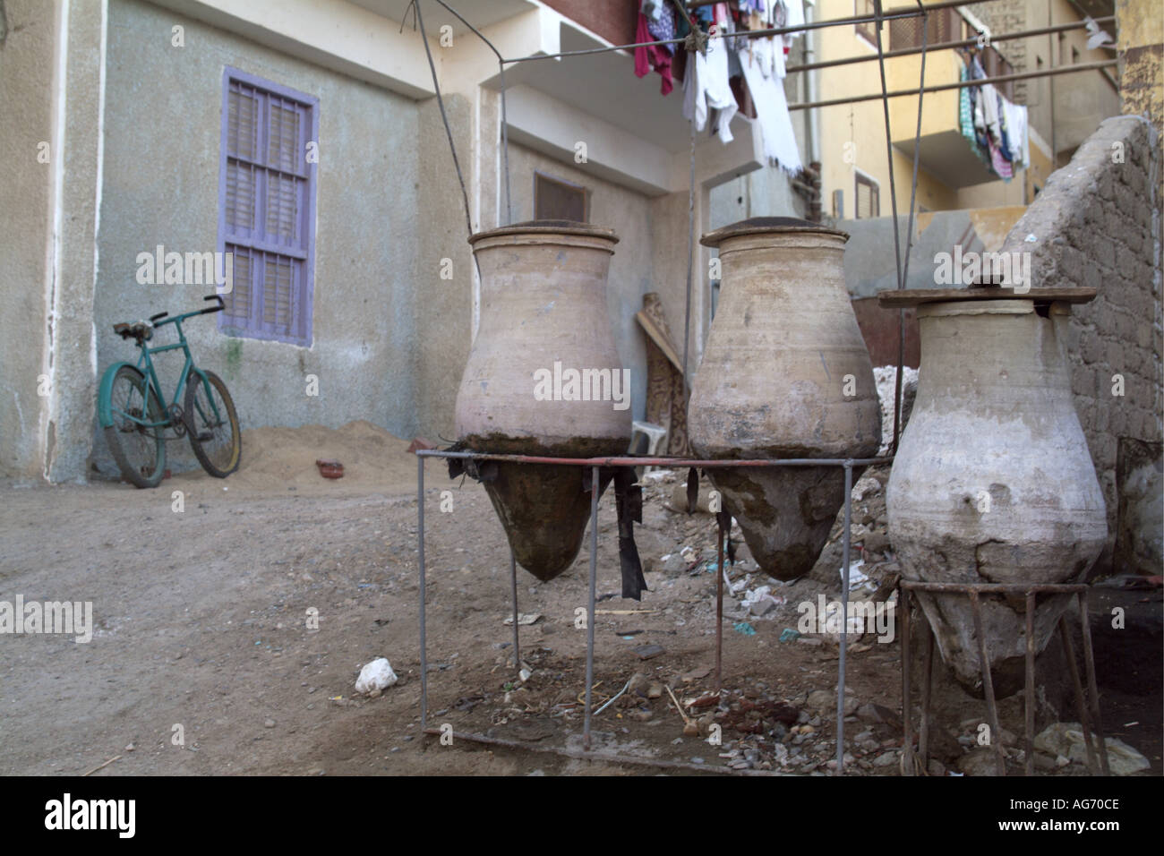 Egypt Red Sea Quoseir Village Three Jars Filled With Drinkable Water In The Street Stock Photo