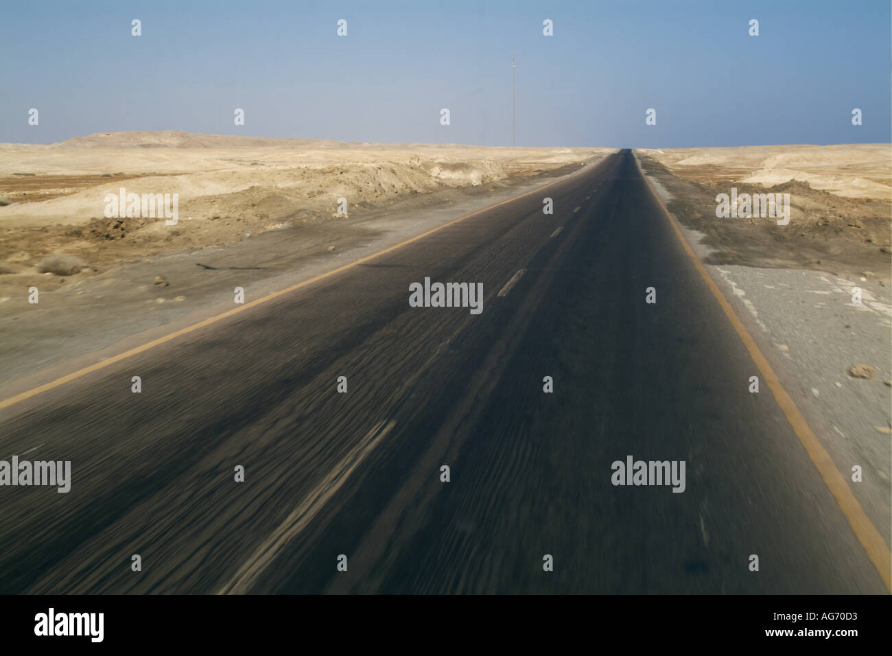 Egypt Red Sea Between Quoseir And Marsa Alam - Driving On A Long Straight Empty Highway In The Desert Stock Photo