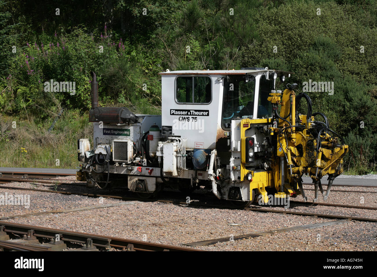 Plasser and Theurer GWS 75 mini rail tamper Crianlarich Perthshire Scotland Stock Photo