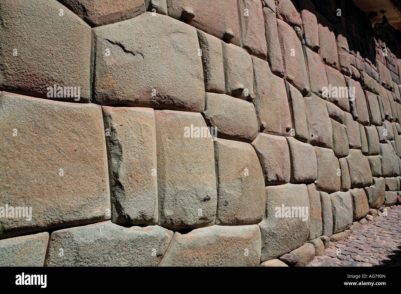 Inca foundations Calle Hatun Rumiyoc in Cuzco Peru Stock Photo