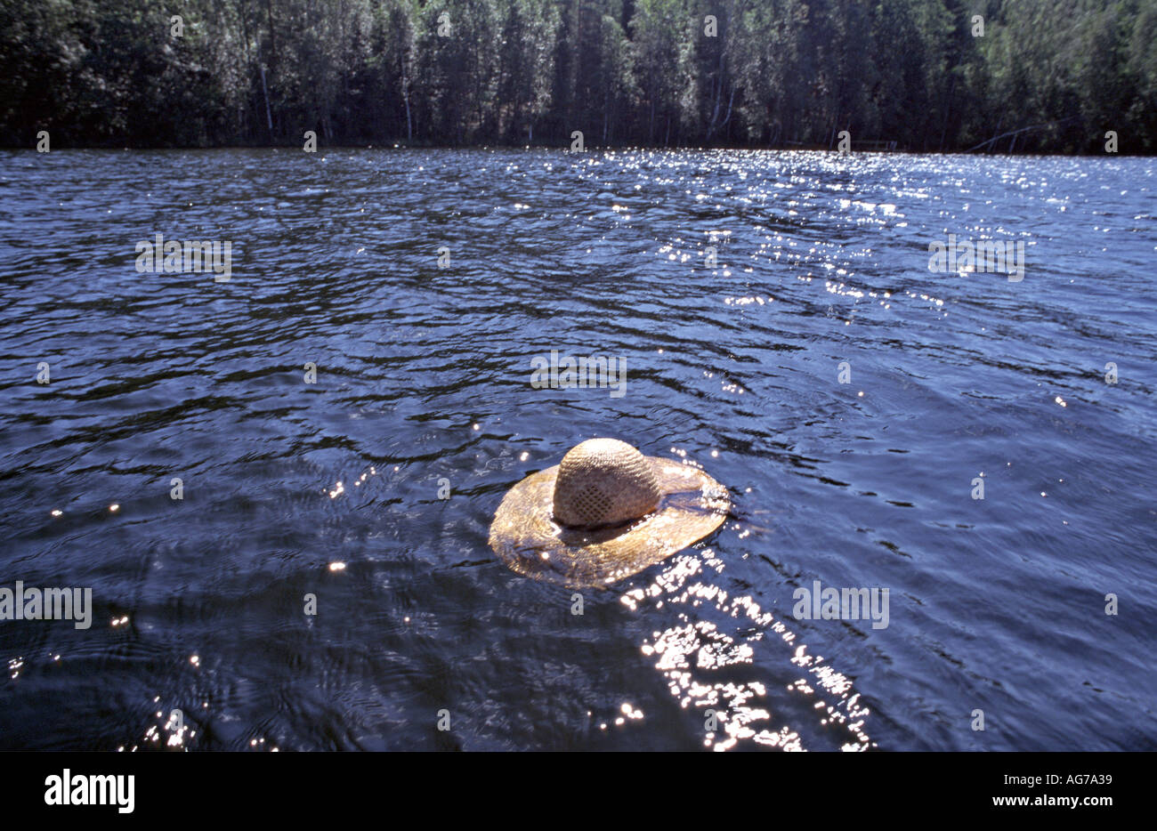 lost hat in a lake Stock Photo