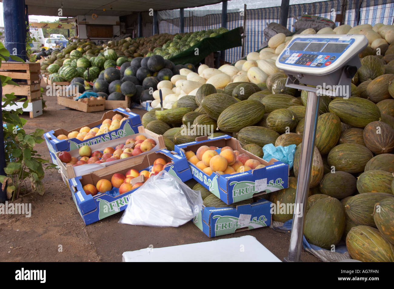 Melons for sale on roadside stall Portugal Stock Photo Alamy