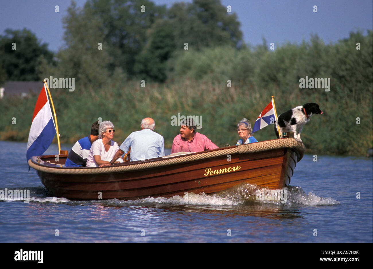 Netherlands Vreeland People making boat trip on river Vecht Stock Photo