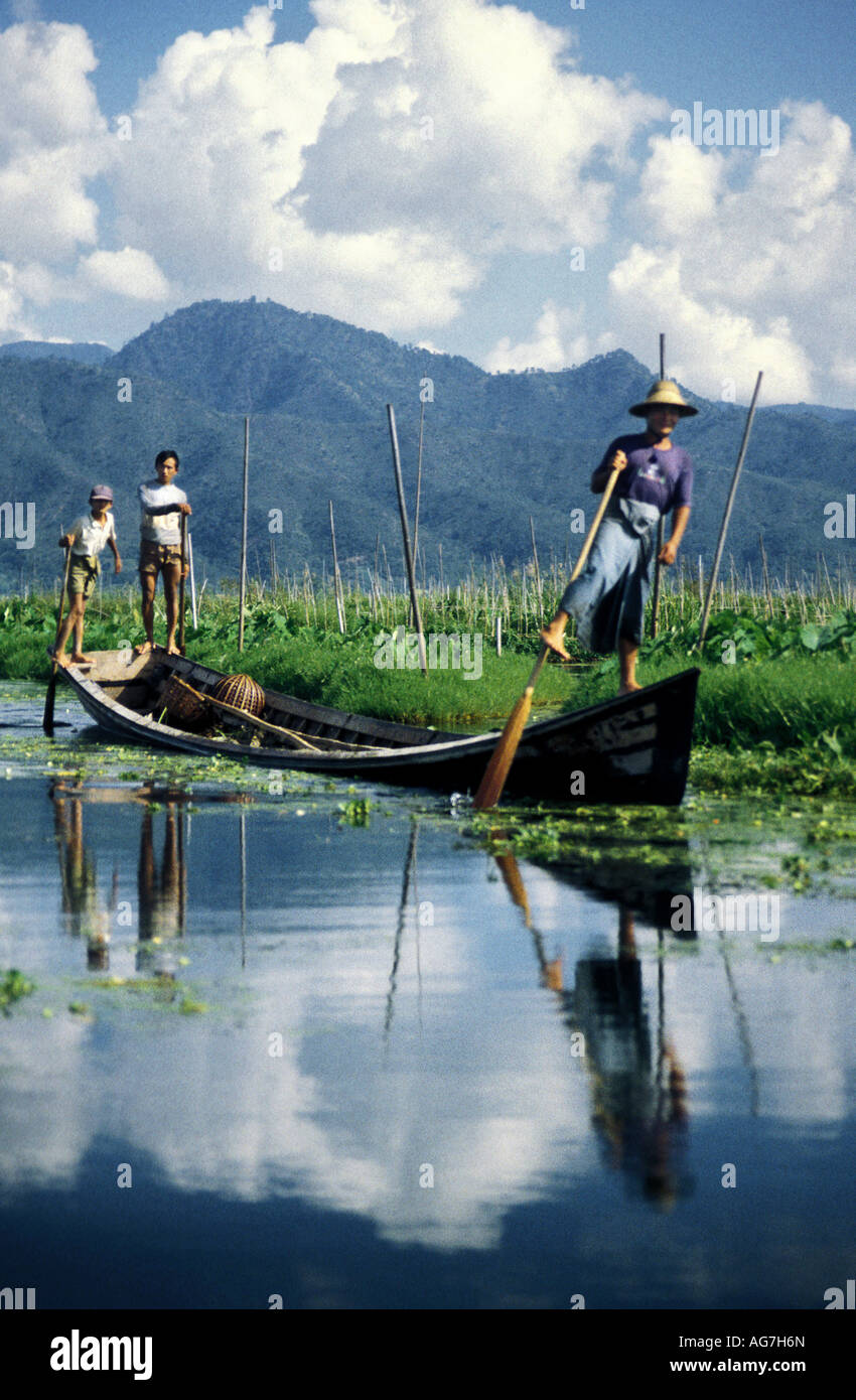 Rowing their boats with their legs is very unique to Inle Lake in Burma ...
