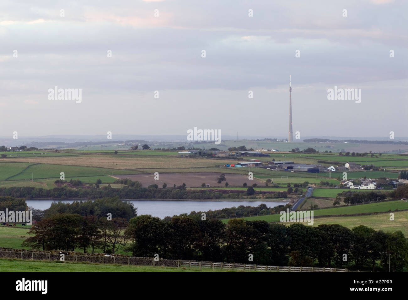 'Emley Moor' television mast and' warning lights' across Ingbirchworth reservoir in Yorkshire 'Great Britain' Stock Photo