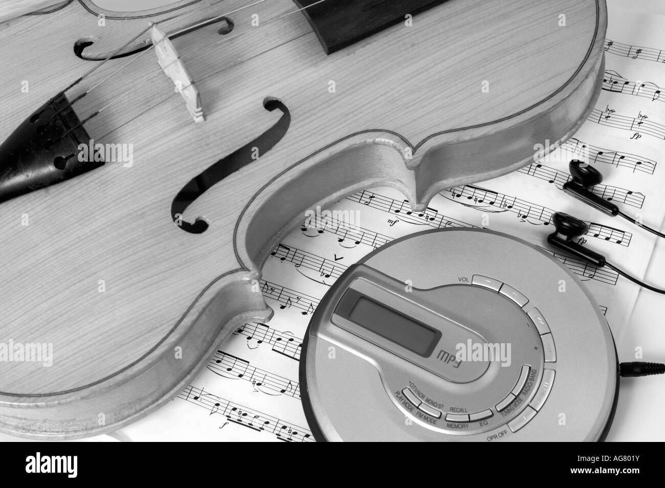 CD player and a violin Modern music Musical instruments and electronics Stock Photo