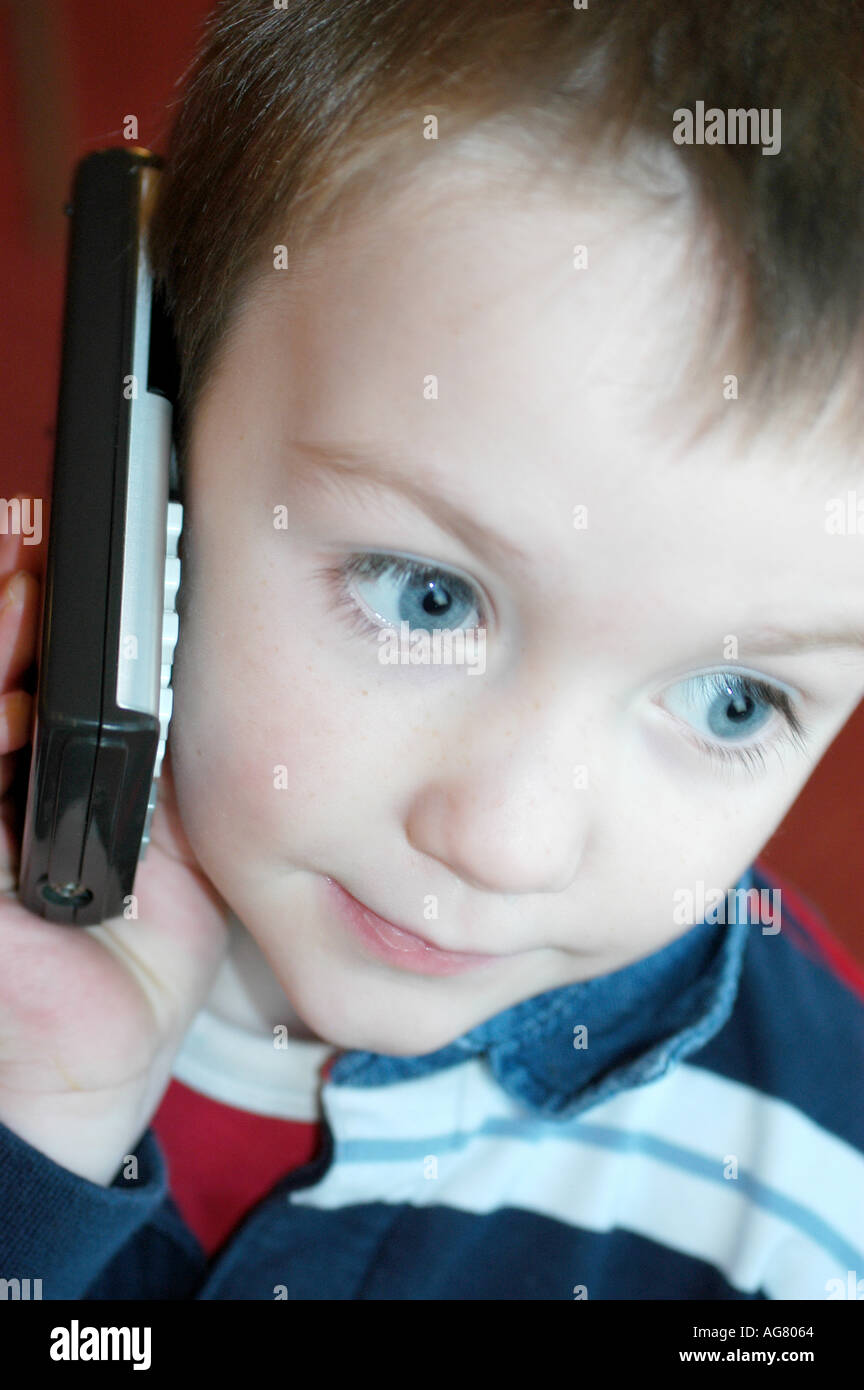 Young Boy Playing With Calculator Stock Photo Alamy