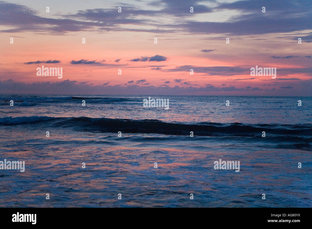 Dusk colors the evening sky over Manzanillo Bay Troncones State of Guerrero Mexico, Pacific Ocean Stock Photo