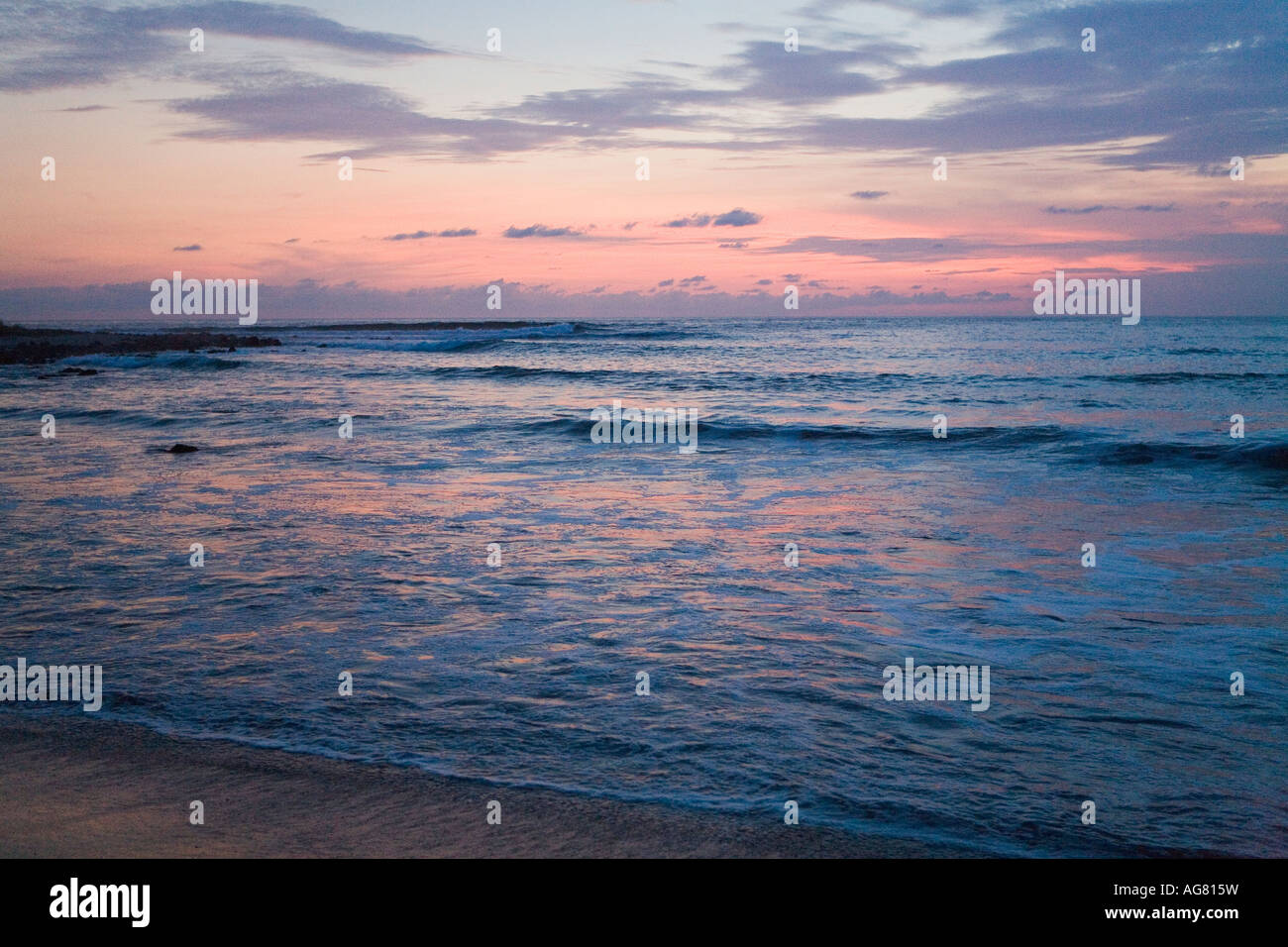 Dusk colors the evening sky over Manzanillo Bay Troncones State of Guerrero Mexico, Pacific Ocean Stock Photo