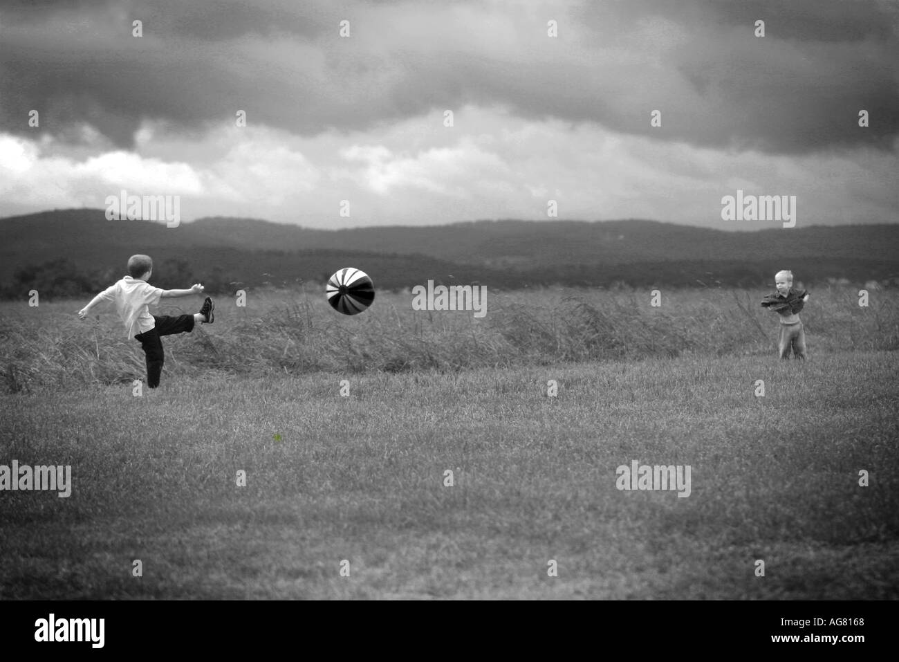 Two boys on a farm Black and White Stock Photos & Images - Alamy