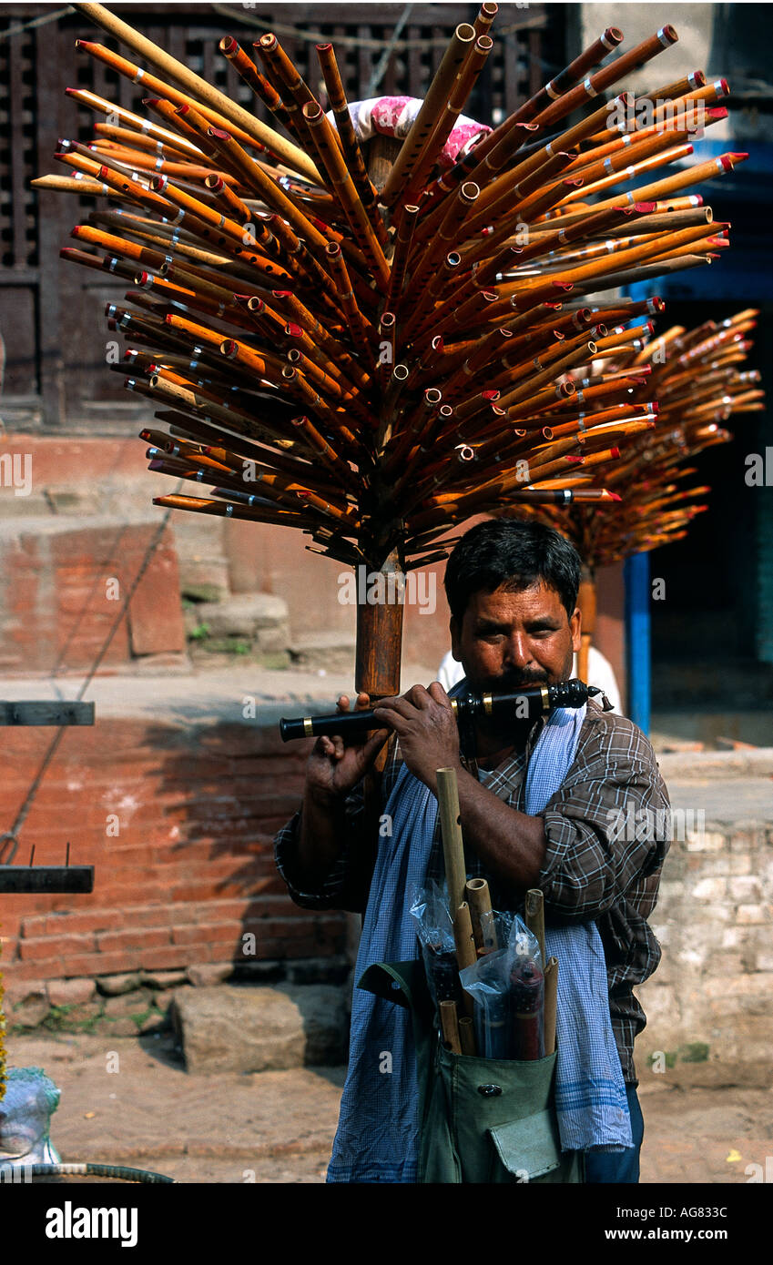 A flute seller demonstrates his wares in kathmandu Stock Photo Alamy