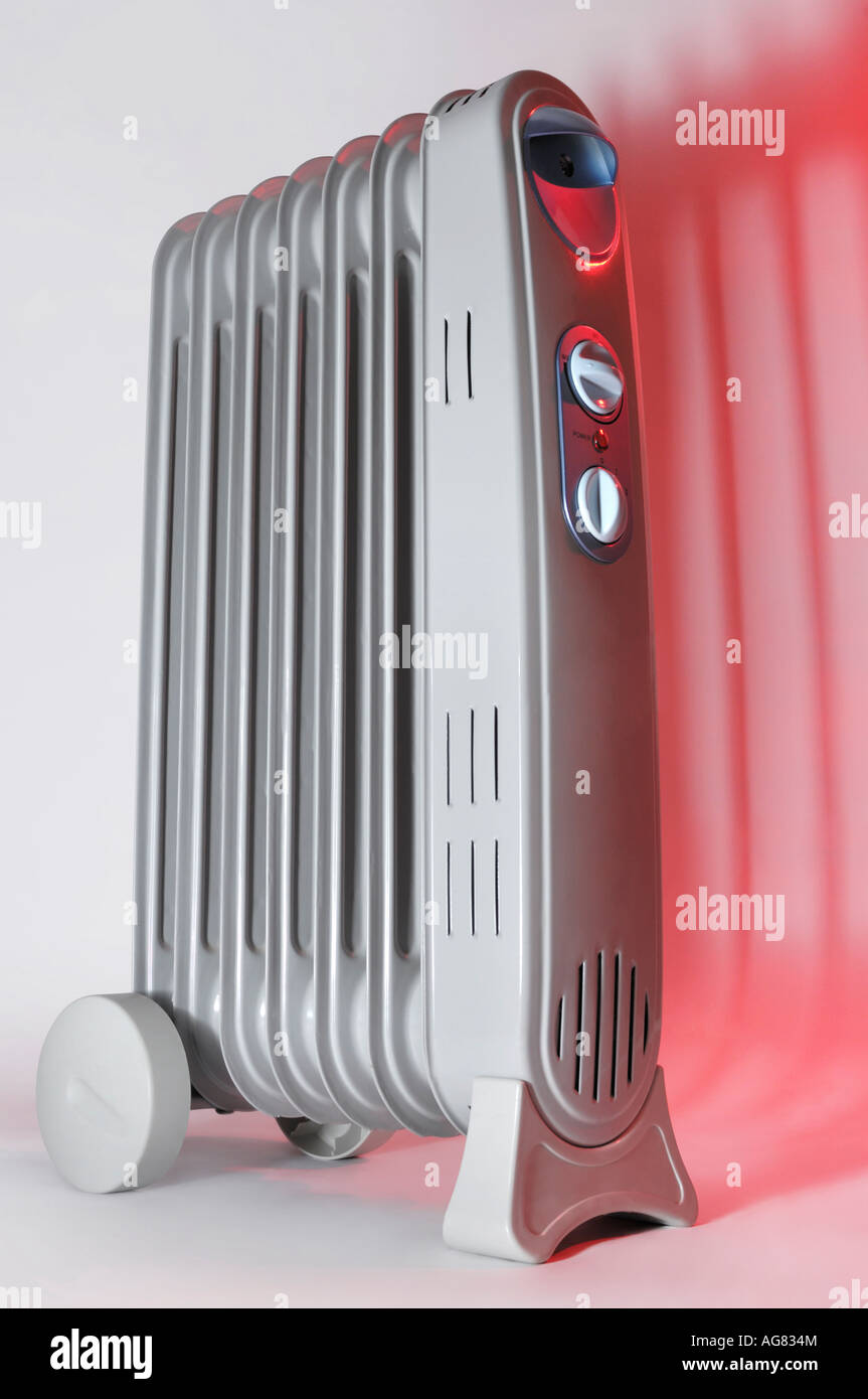 Electric oil filled radiator air heater Stock Photo