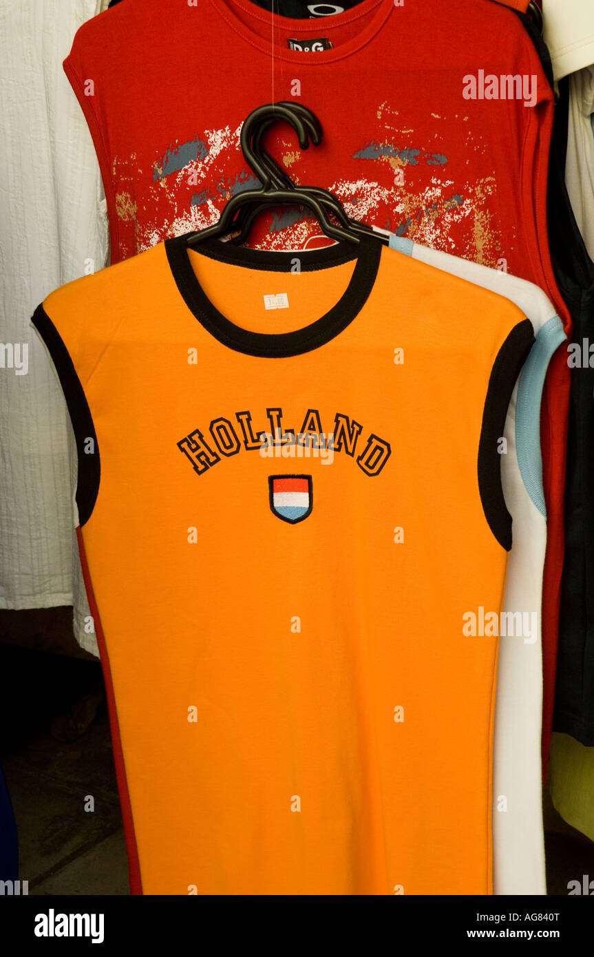 Bright orange vest with 'Holland' and the Dutch flag printed on it. For sale  in street market, Chania, Crete, Greece Stock Photo - Alamy