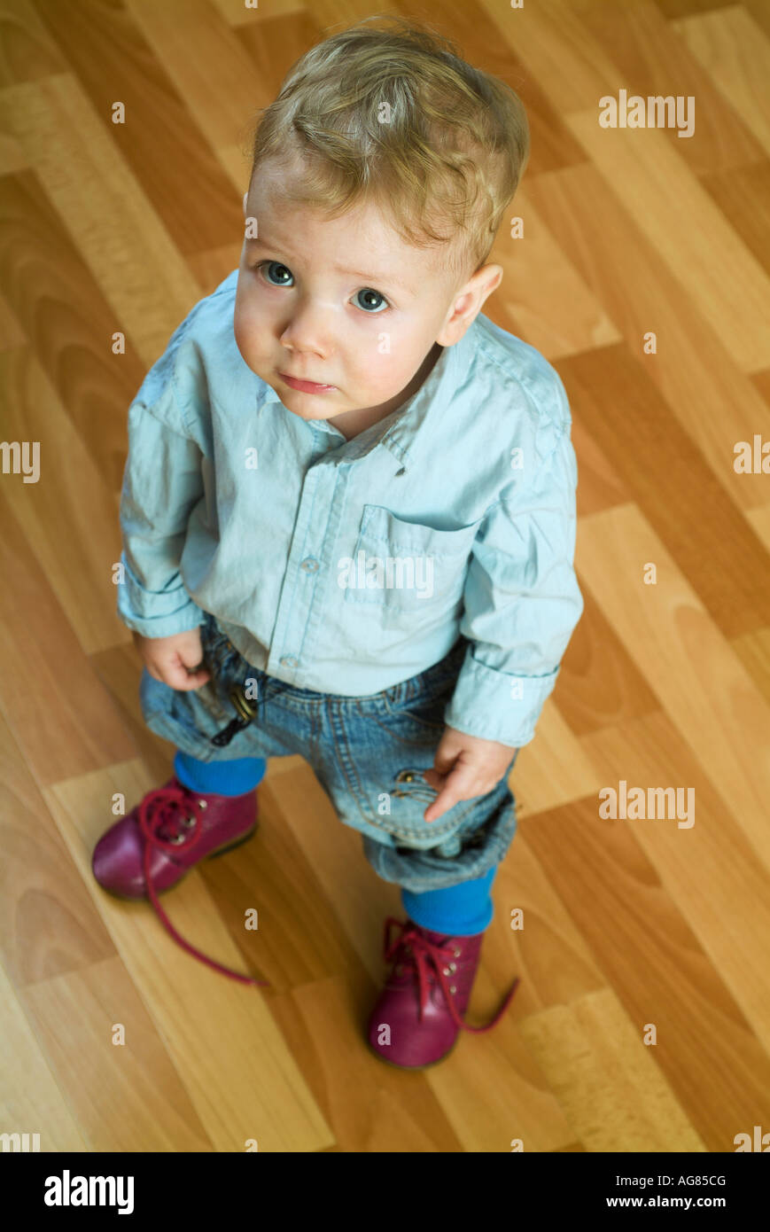 Toddler with untied shoes Stock Photo Alamy