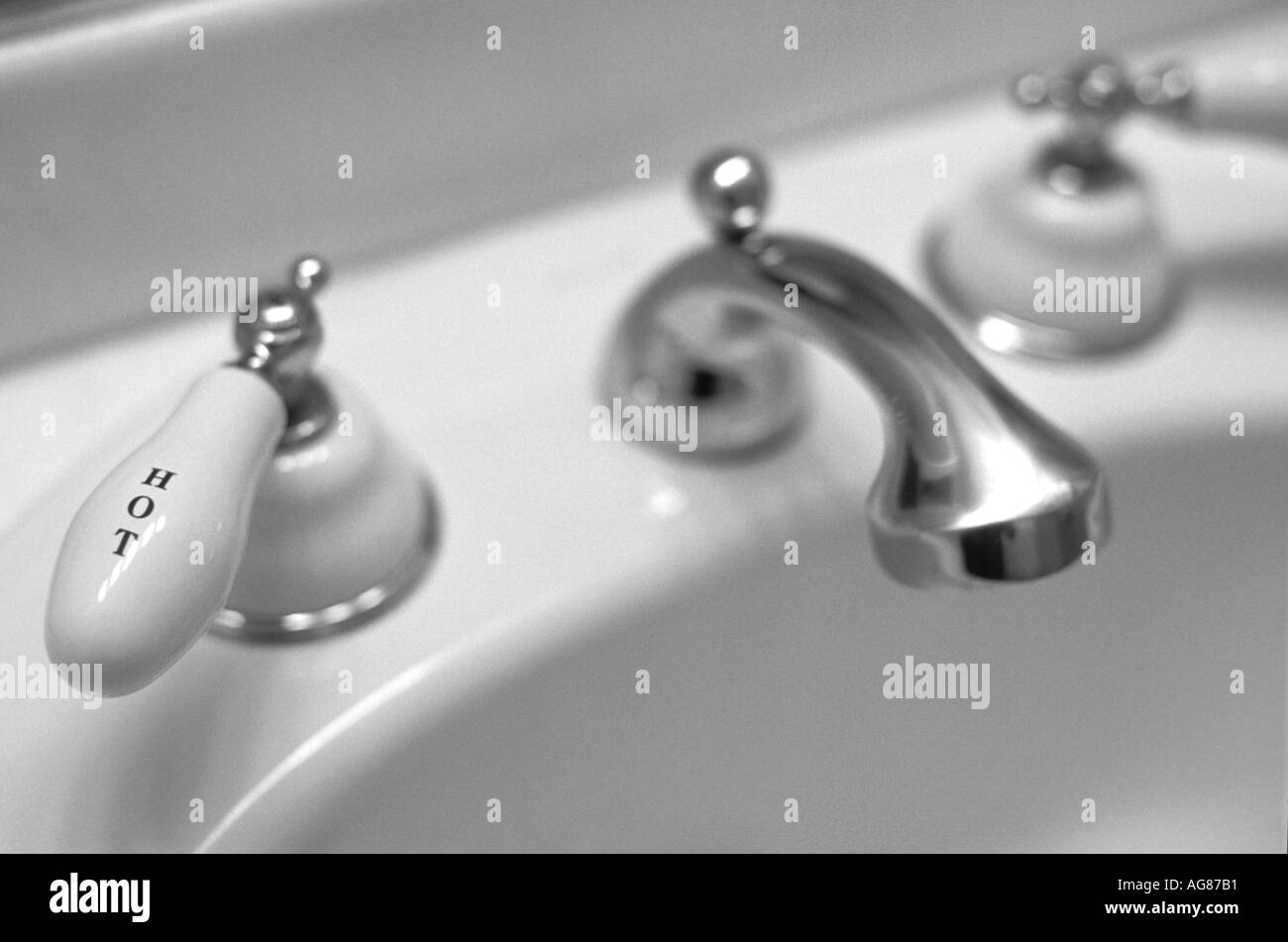 Sink water faucet with work Hot in focus Stock Photo