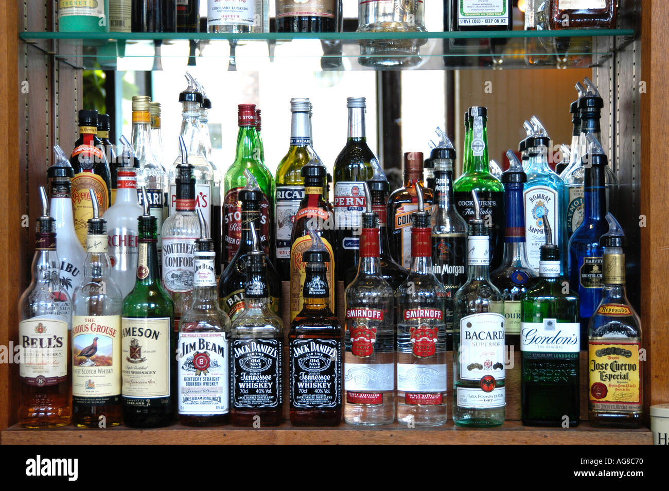 Spirit bottles behind the bar, UK Stock Photo Alamy