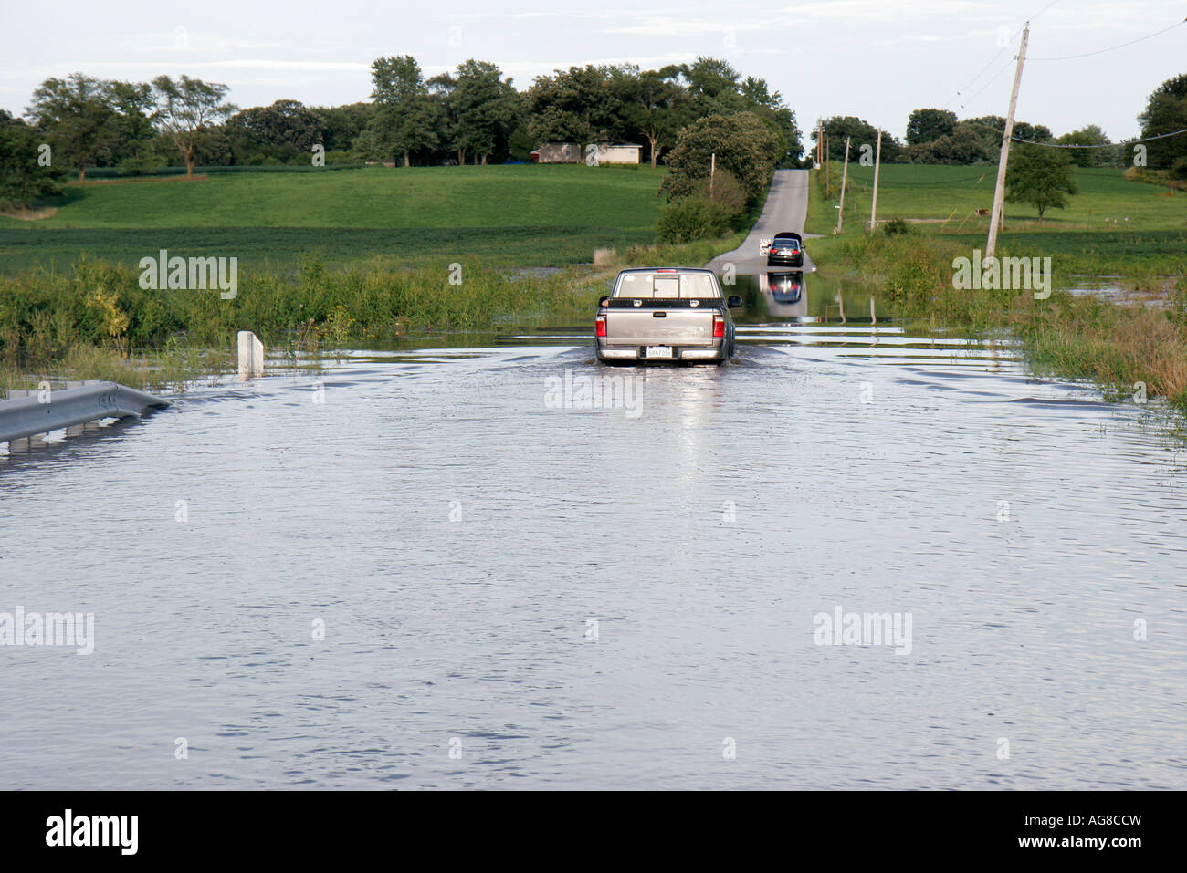 Indiana Lake County,Belshaw,West Creek,flooding,rural road,pickup truck,lorry,high water,IL070824015 Stock Photo