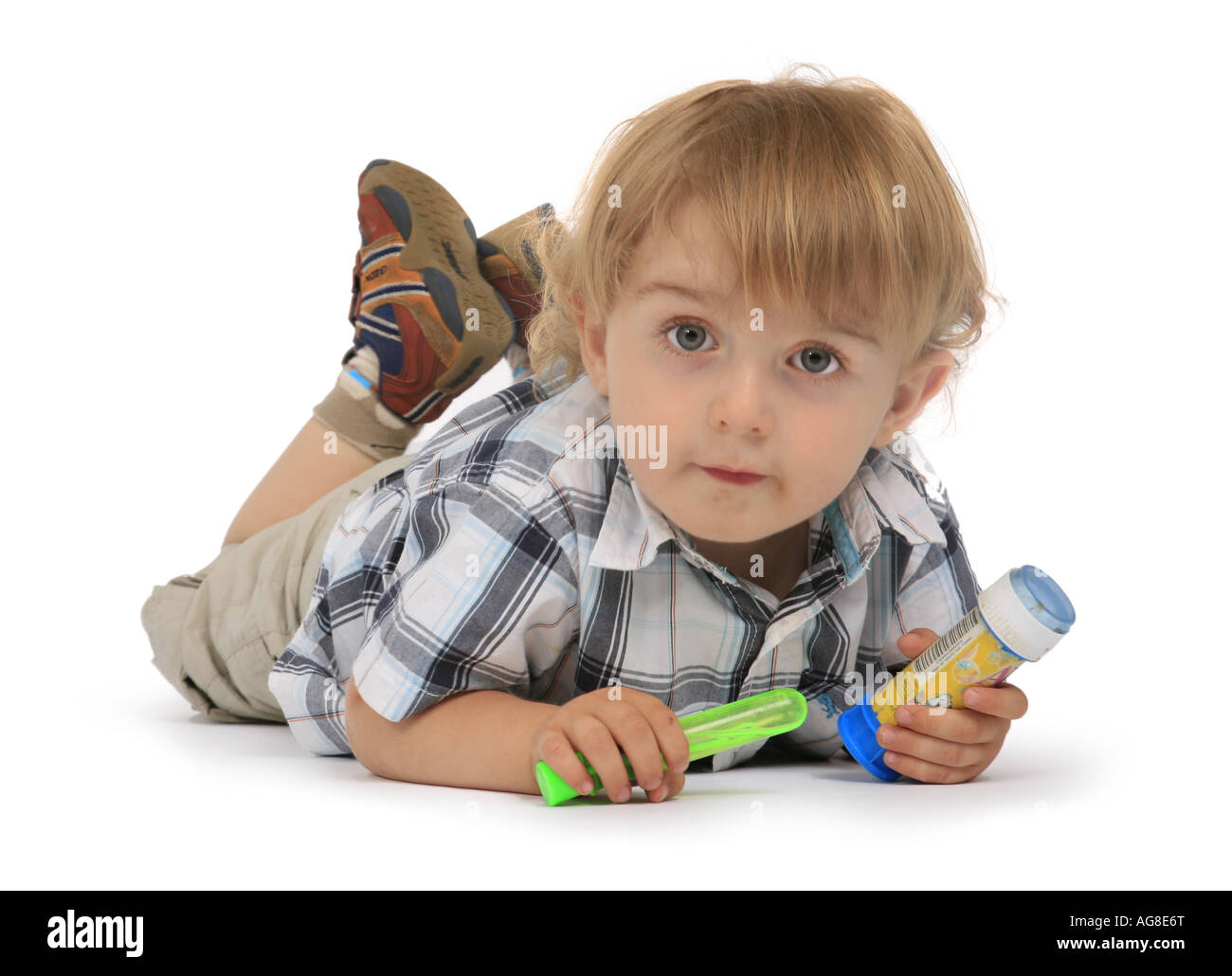 small boy lying on the floor Stock Photo - Alamy