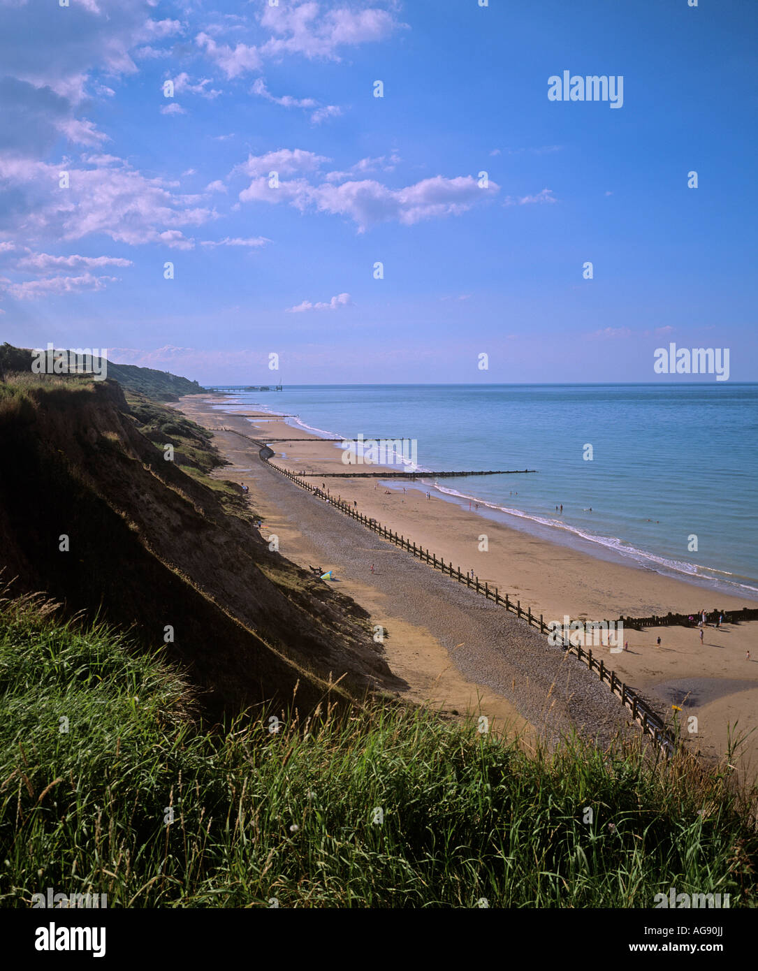 Groynes and wave barriers below the unstable cliffs between Overstrand and Cromer on the North Norfolk Coast summer 2007 Stock Photo