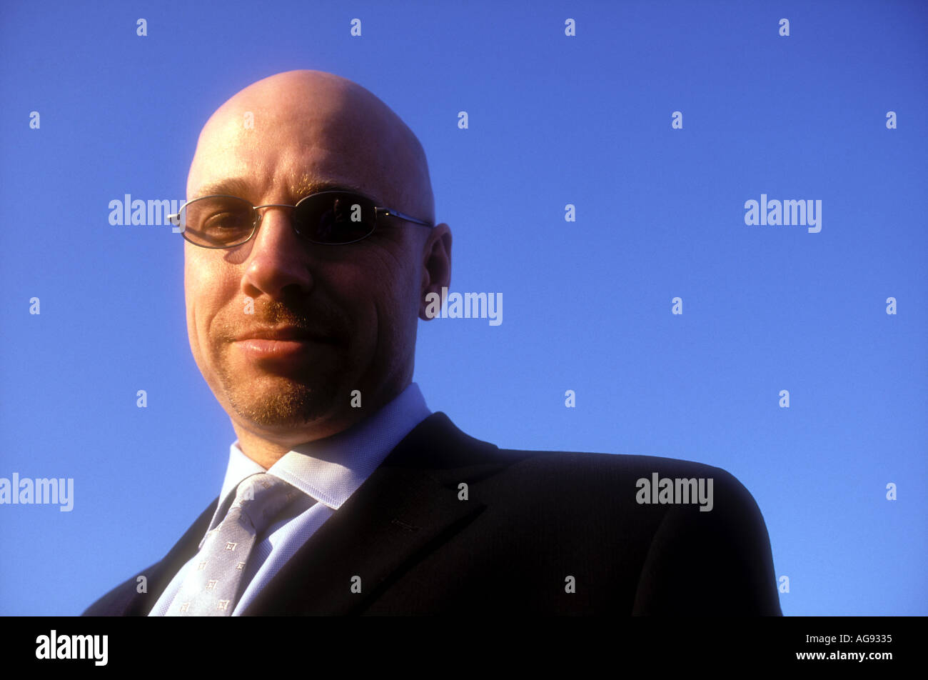 Bald man in suit Model released image Stock Photo