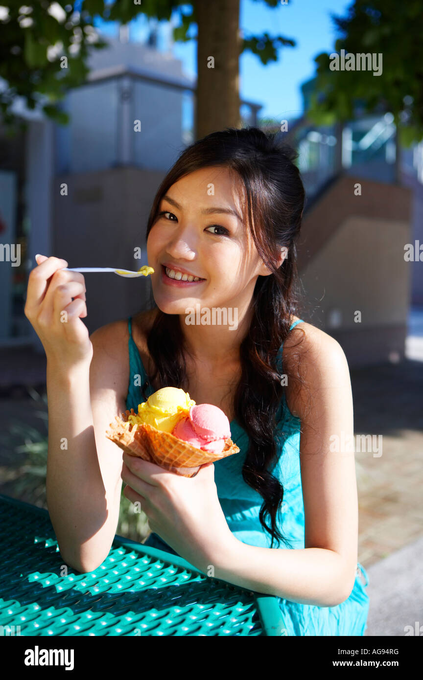 Young Lady Eating IceCream Stock Photo Alamy