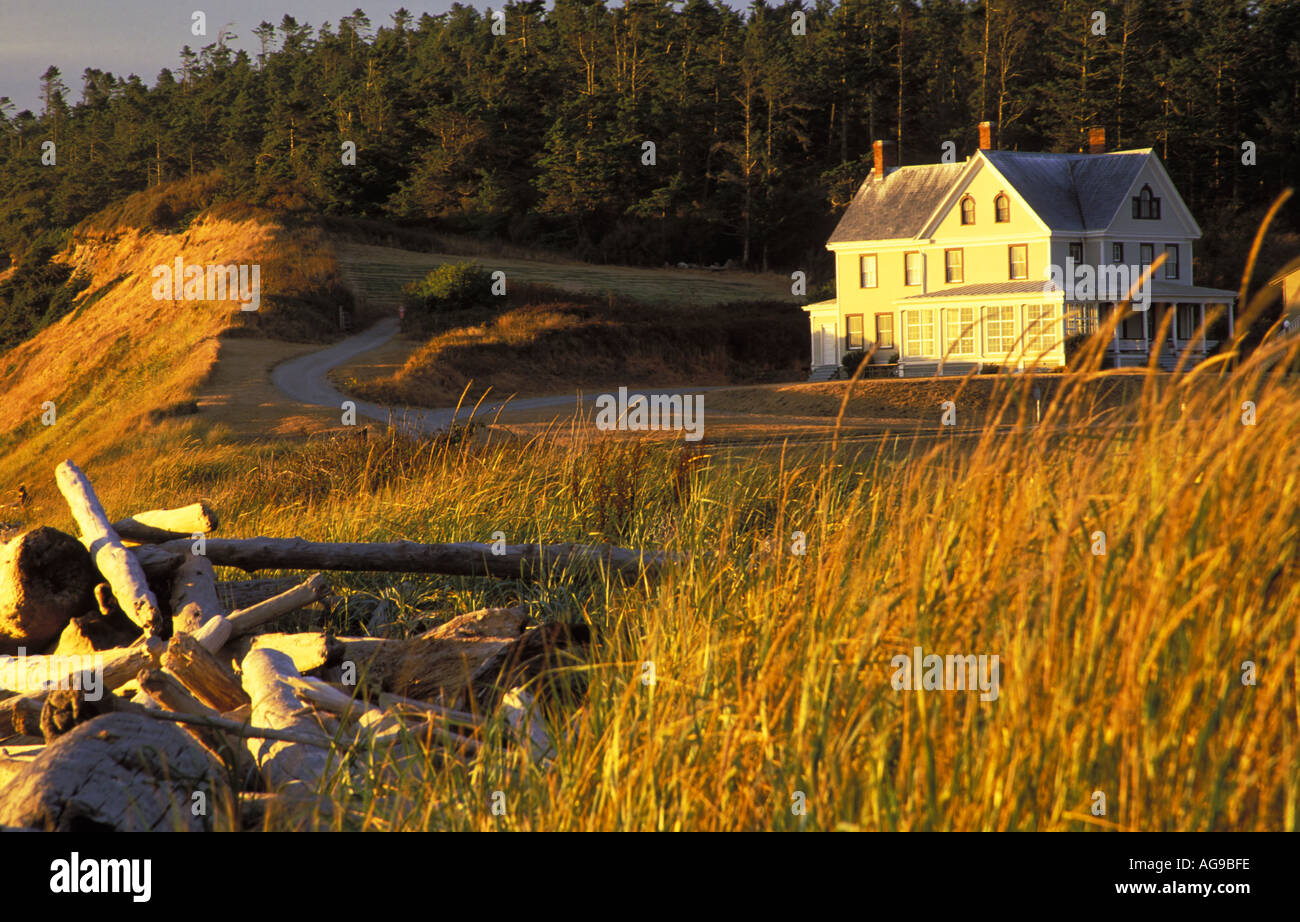 Officer's quarters on beach with sea grass Fort Casey State Park Coupeville Whidbey Island Washington Stock Photo