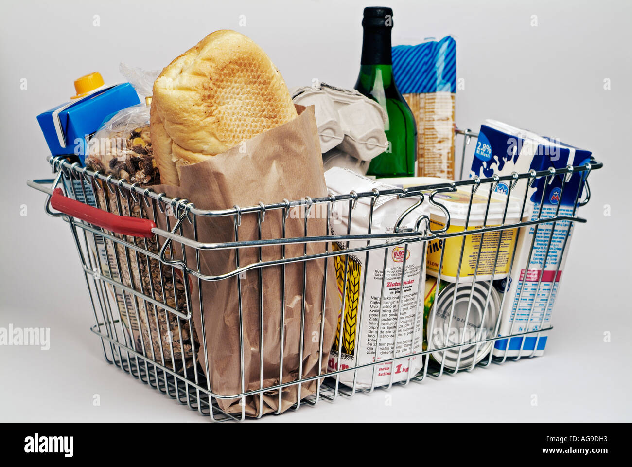 Shopping Basket Full of Groceries Stock Photo - Alamy