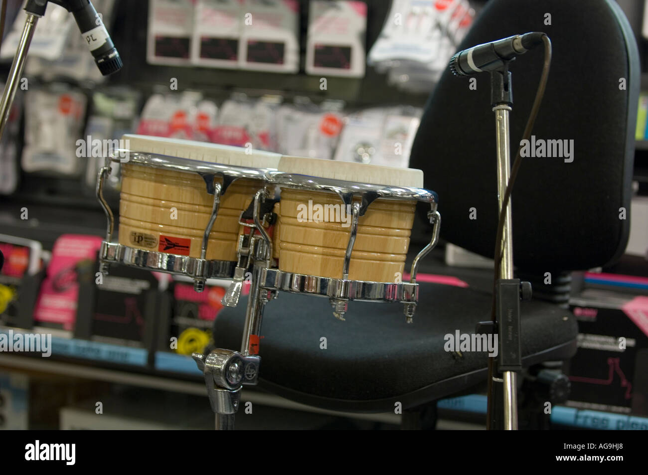 Bongo drums and microphones ready for band performance Stock Photo Alamy