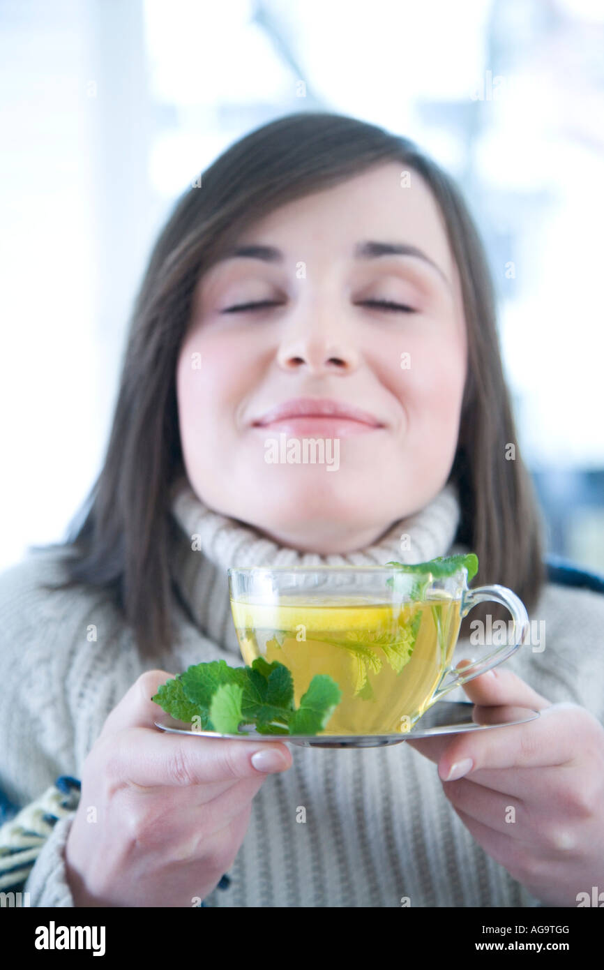 woman drinking lemon tea Stock Photo Alamy