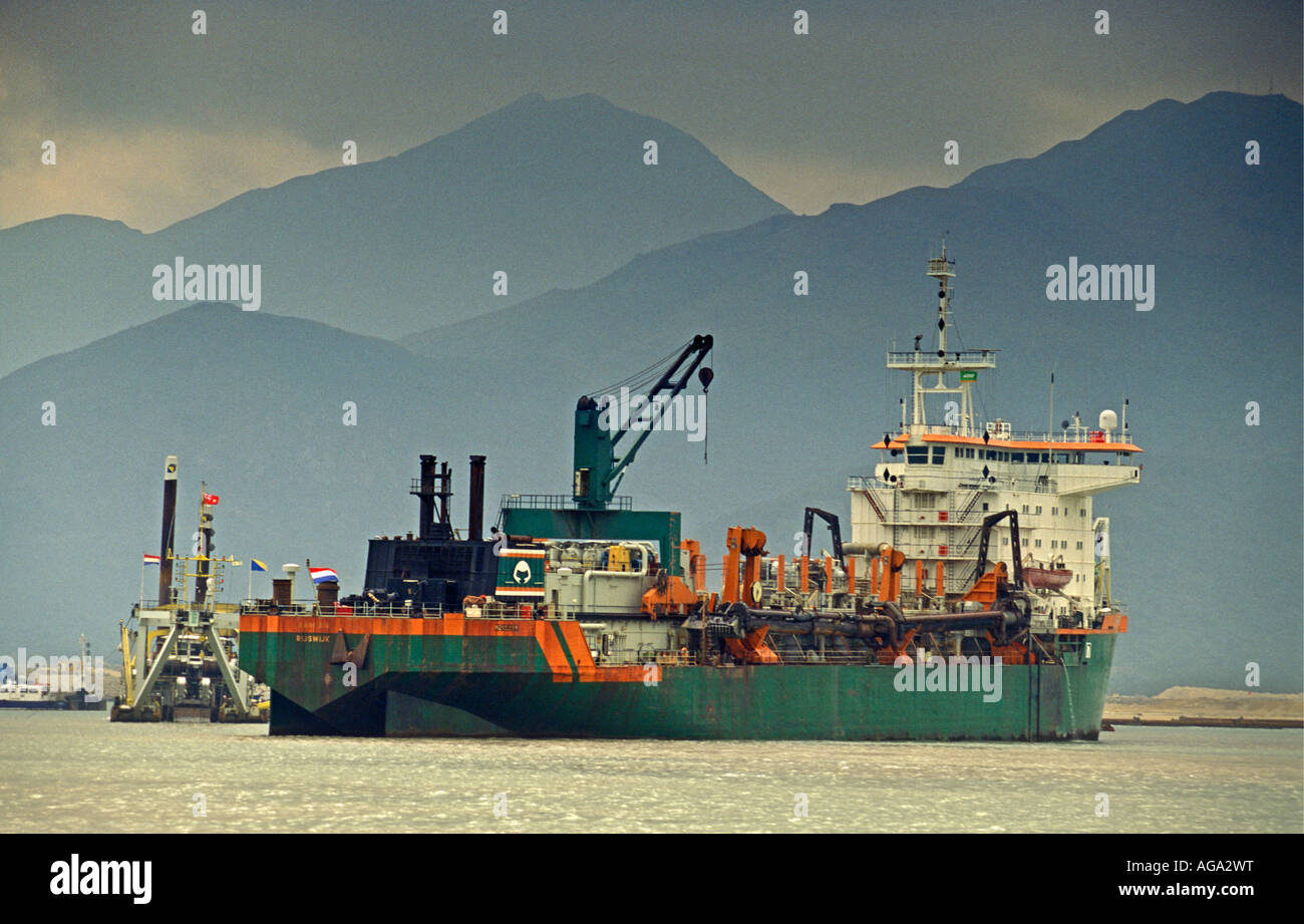 China, Hong Kong, Ship at construction site of airport Chek Lap Kok 1996 Stock Photo