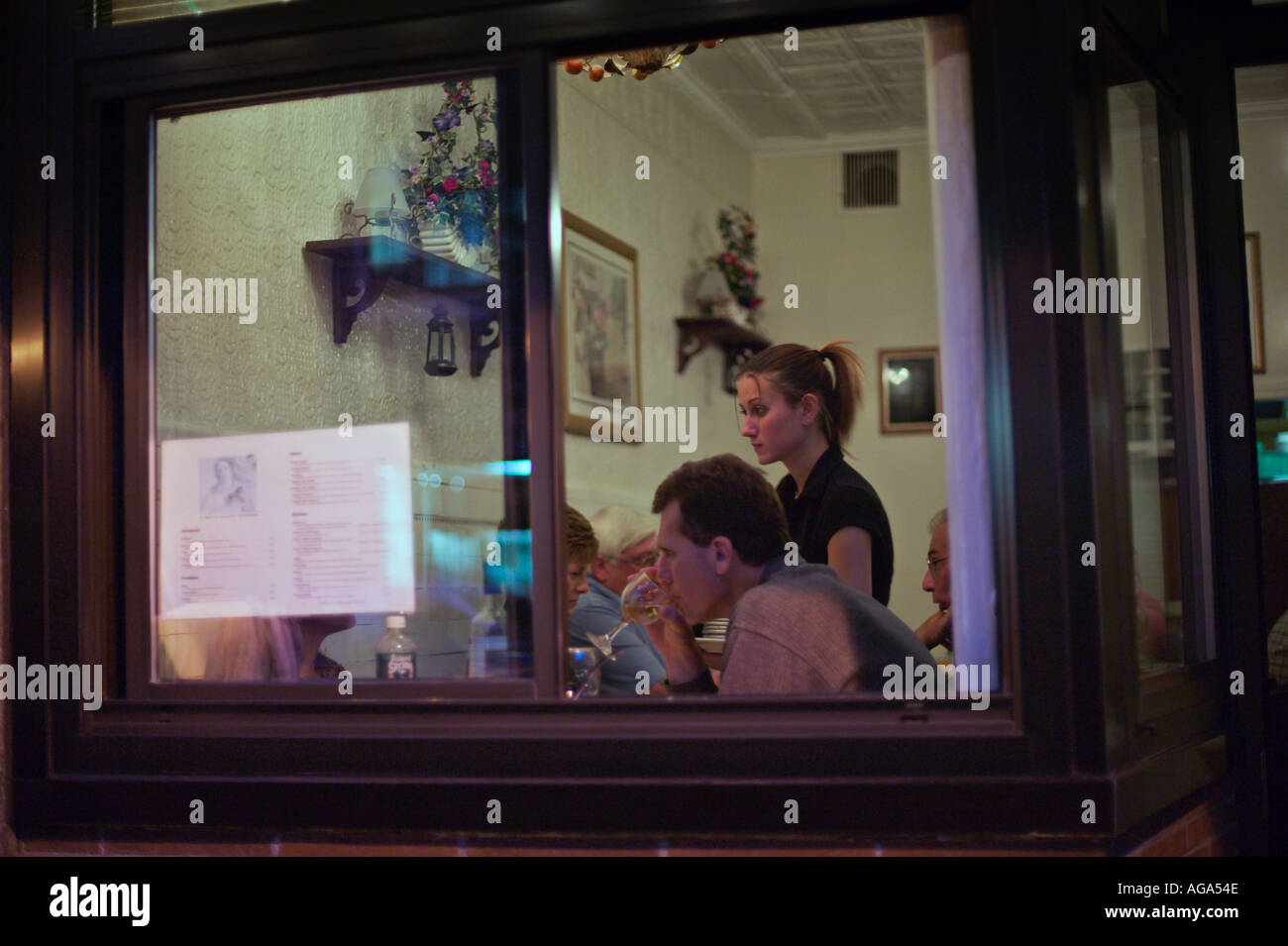 Diners in Italian restaurant on Hanover Street in the Italian District