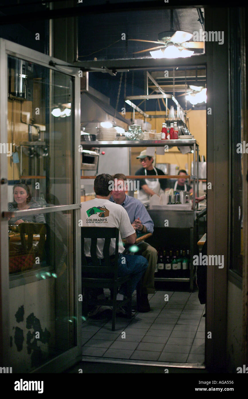 View through doorway of diners at restaurant on Hanover Street in the