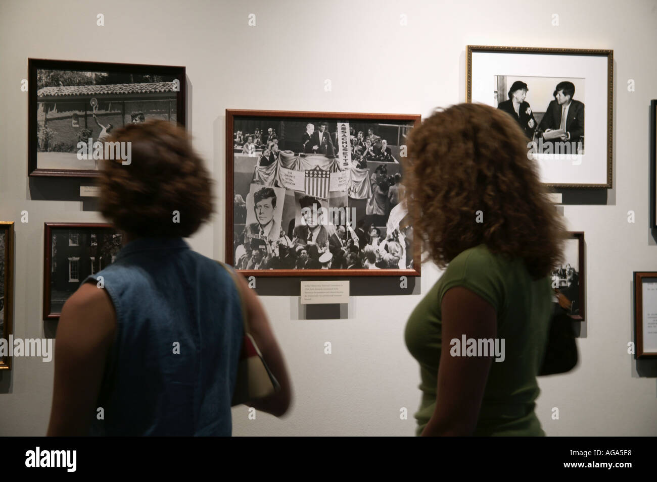 Visitors to John F Kennedy Library and Museum Boston MA viewing Kennedy historical family photos Stock Photo