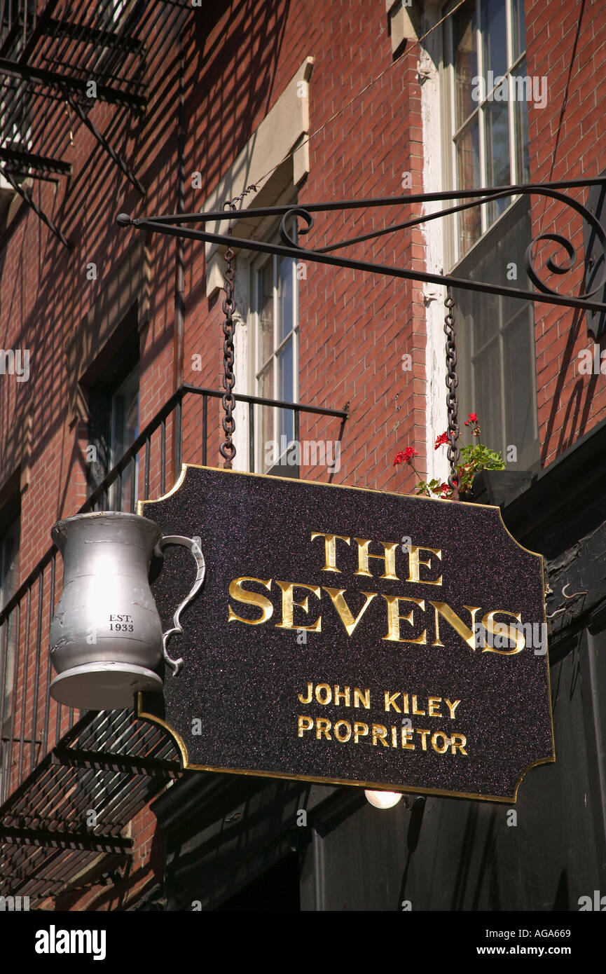 Unique signs on Beacon Hill graphically show type of business a Pub or Tavern Boston MA Stock Photo