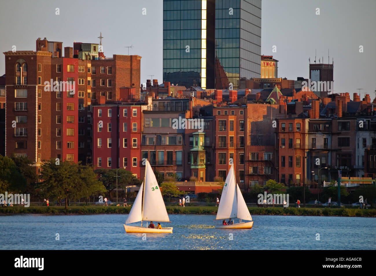 Brownstones around the base of the Hancock Tower with two sailboats on
