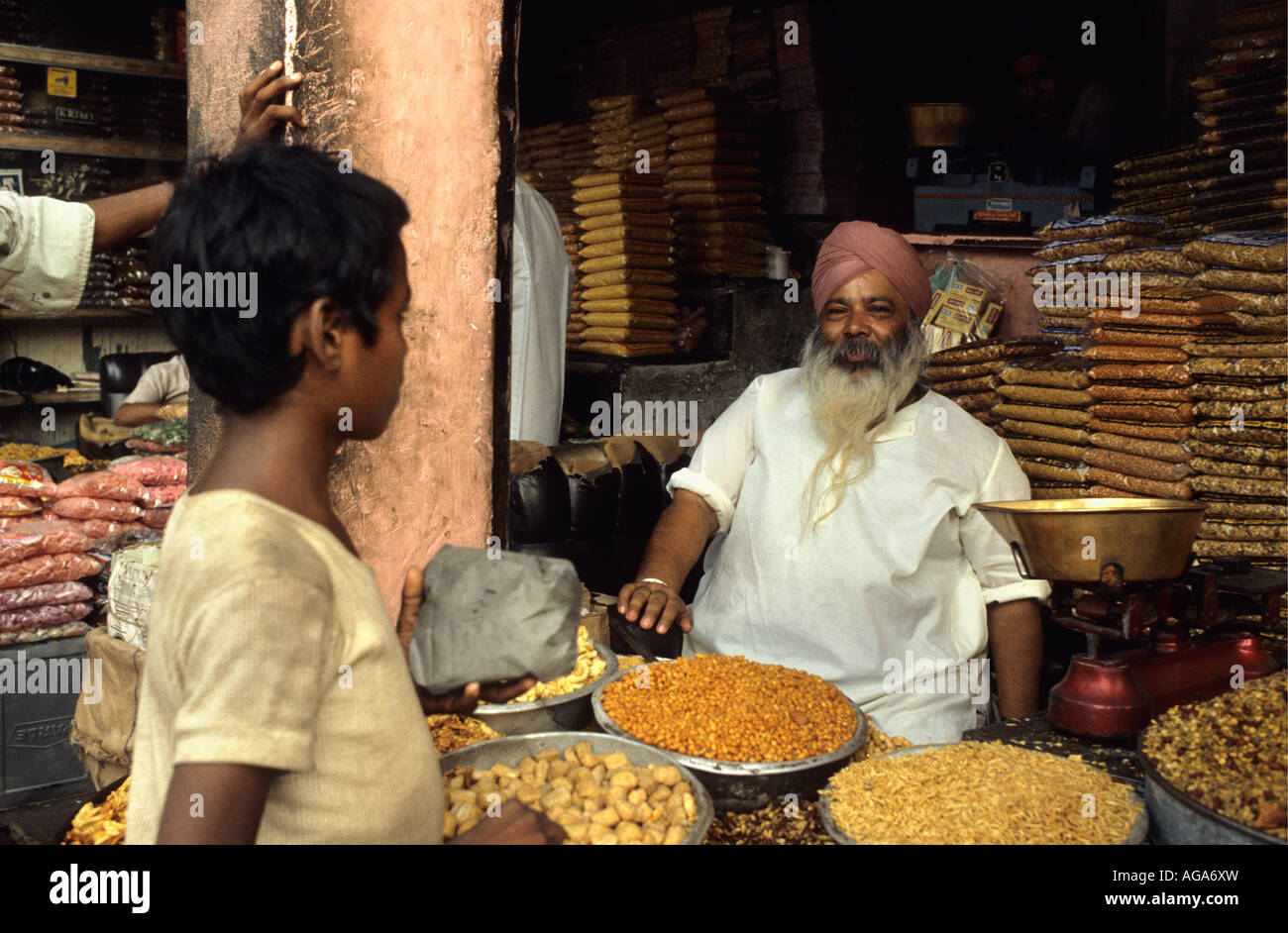 India, Amer, Rajasthan, Man selling spices at shop Stock Photo