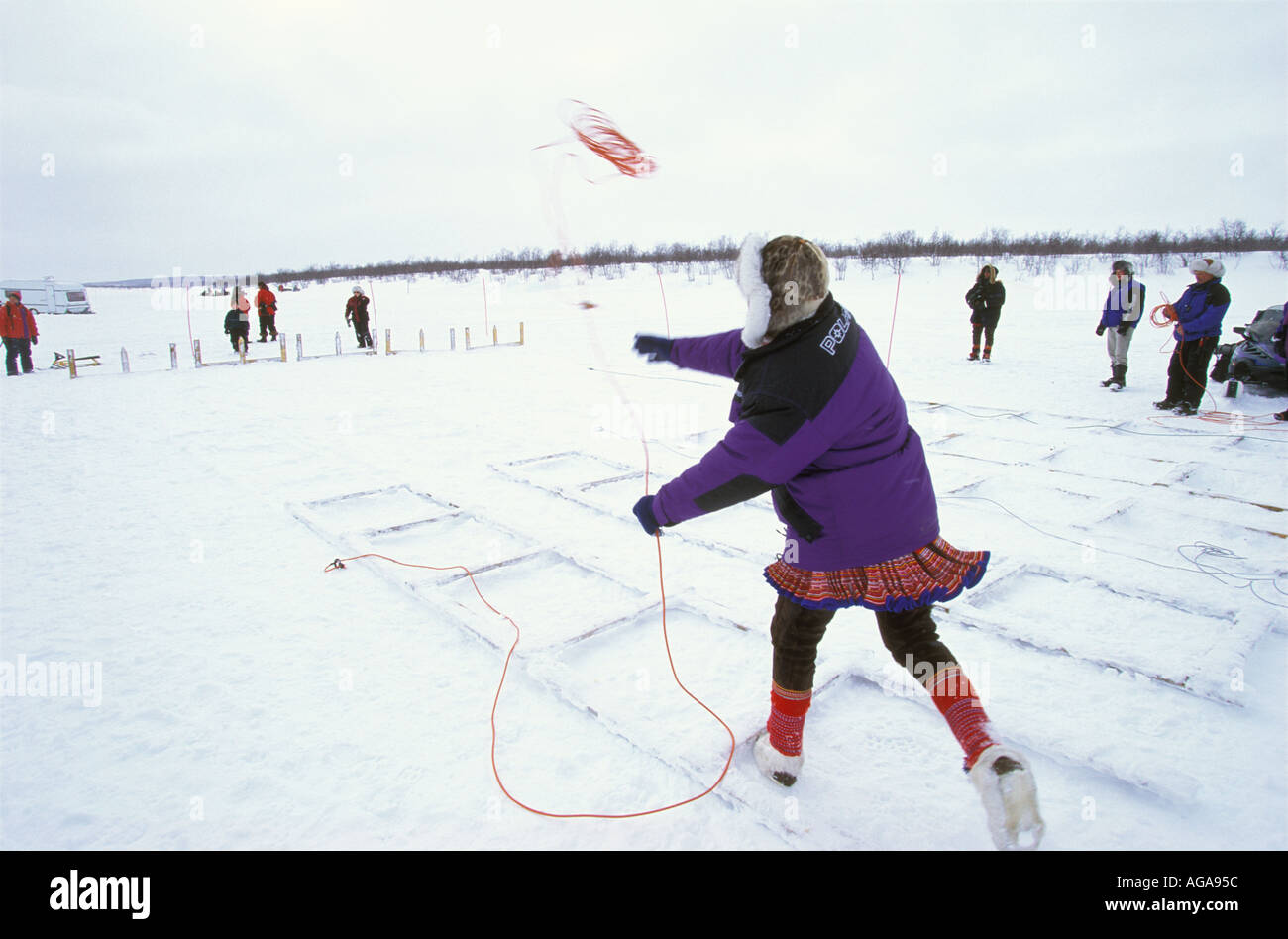 A Saami throws his lasso at the lassothrowing contest of the Easter