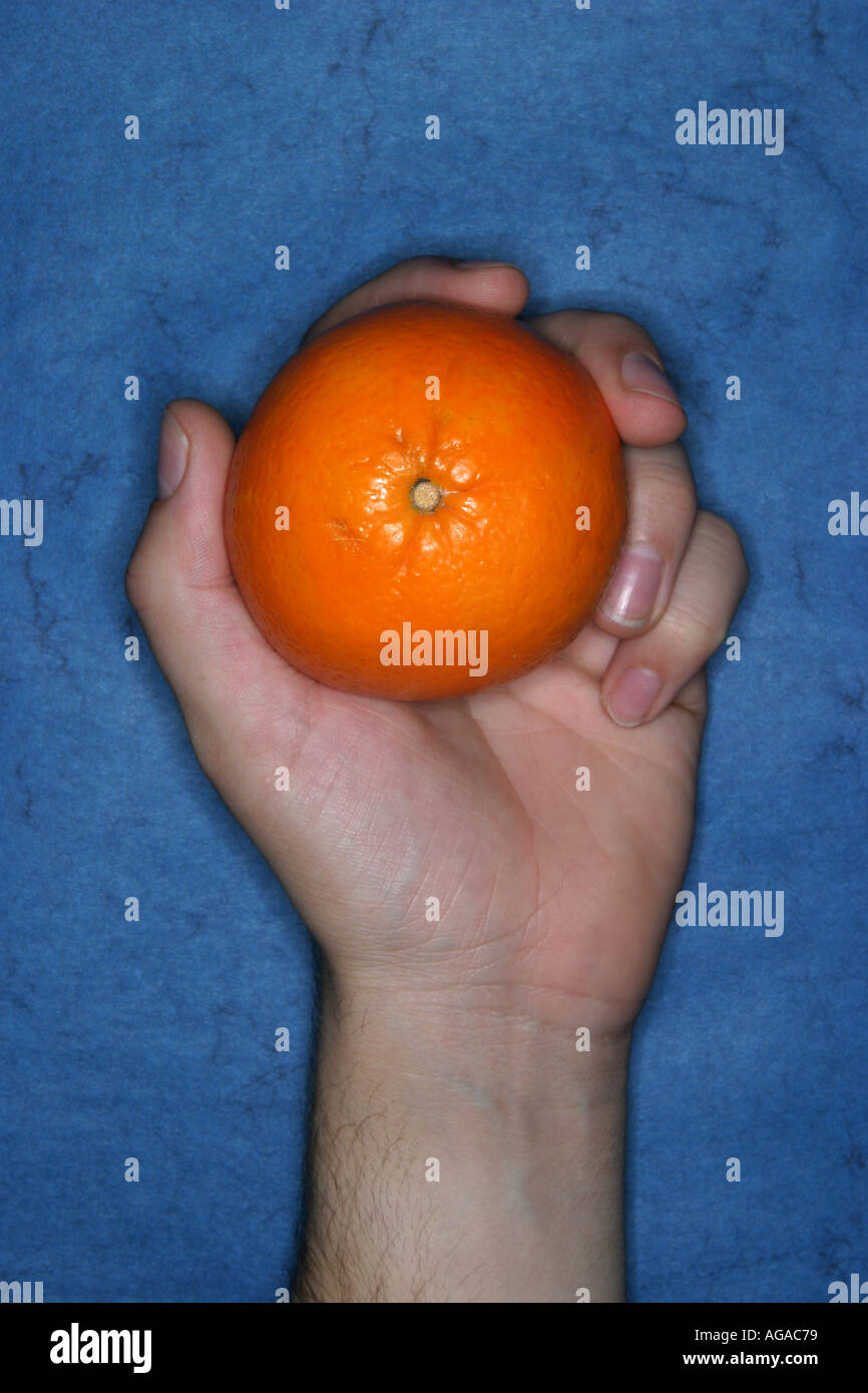 Man orange hand hi-res stock photography and images - Alamy