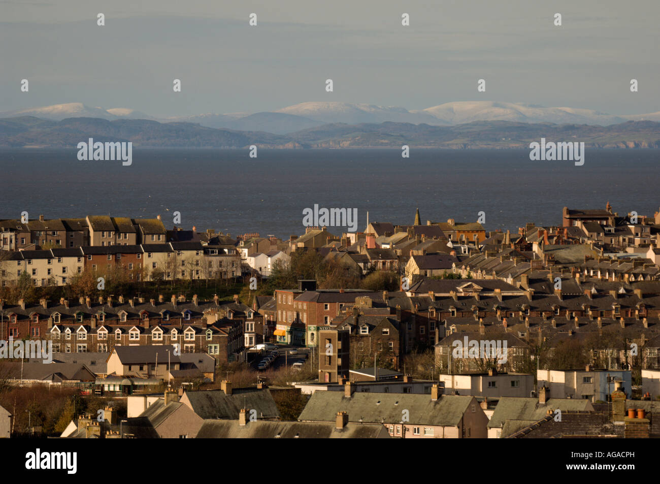 Looking across the town of Maryport towards the Solway Estuary and the Scottish coastline Stock Photo