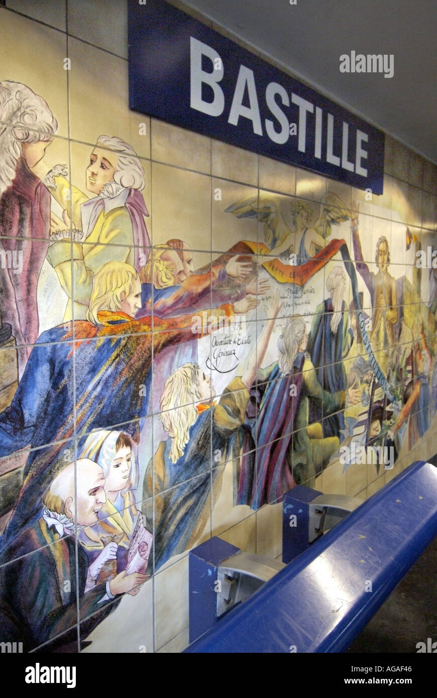 Paris Bastille metro underground railway station platform with tiled wall panels illustrating historical events Stock Photo