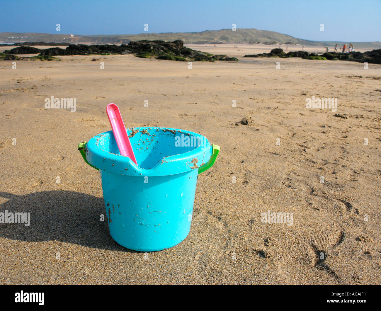 Bucket and spade on beach Stock Photo Alamy
