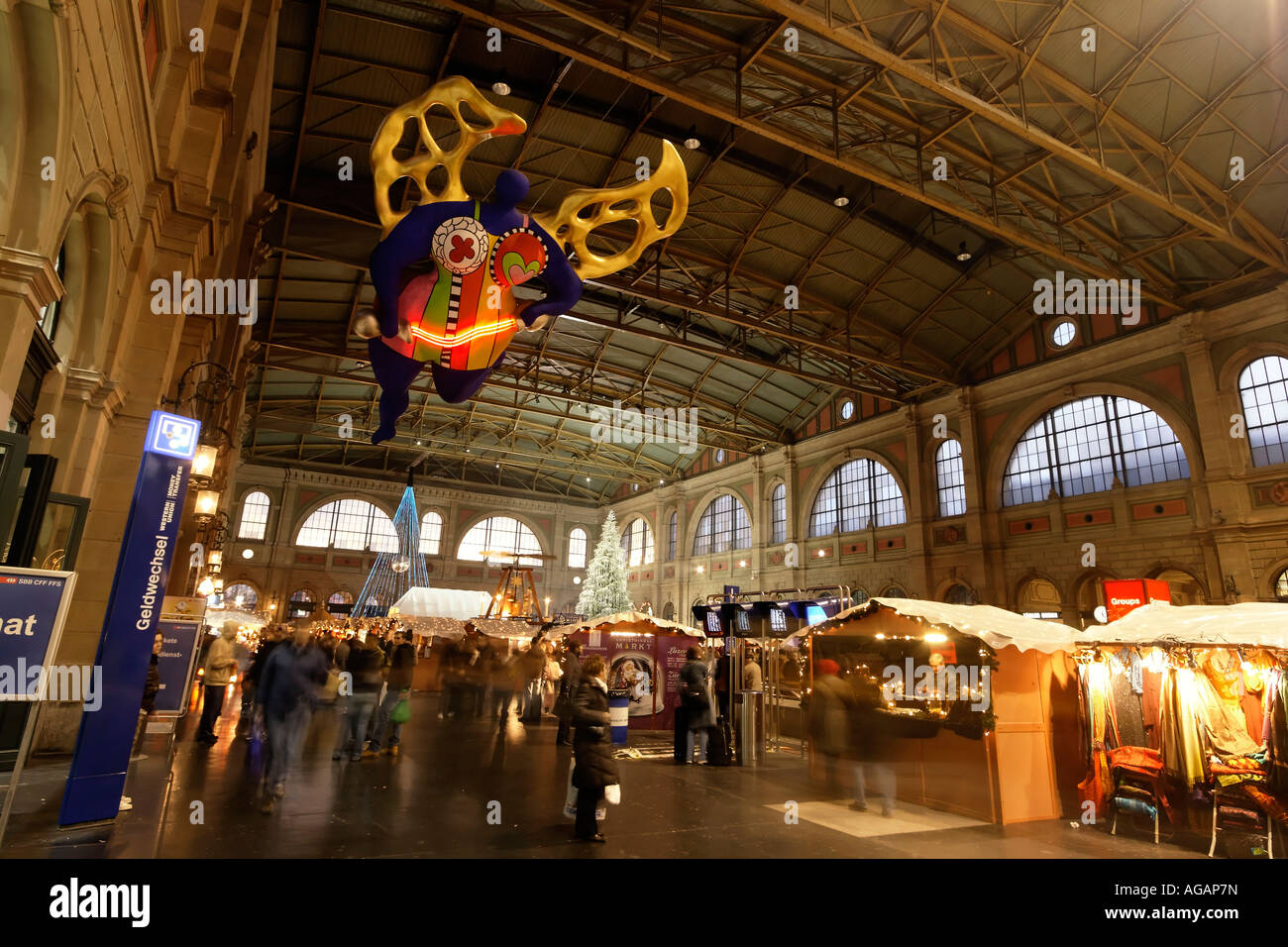 Zuerich main station christmas decoration interieur Niki de Saint Phalle s angel of travellers Stock Photo