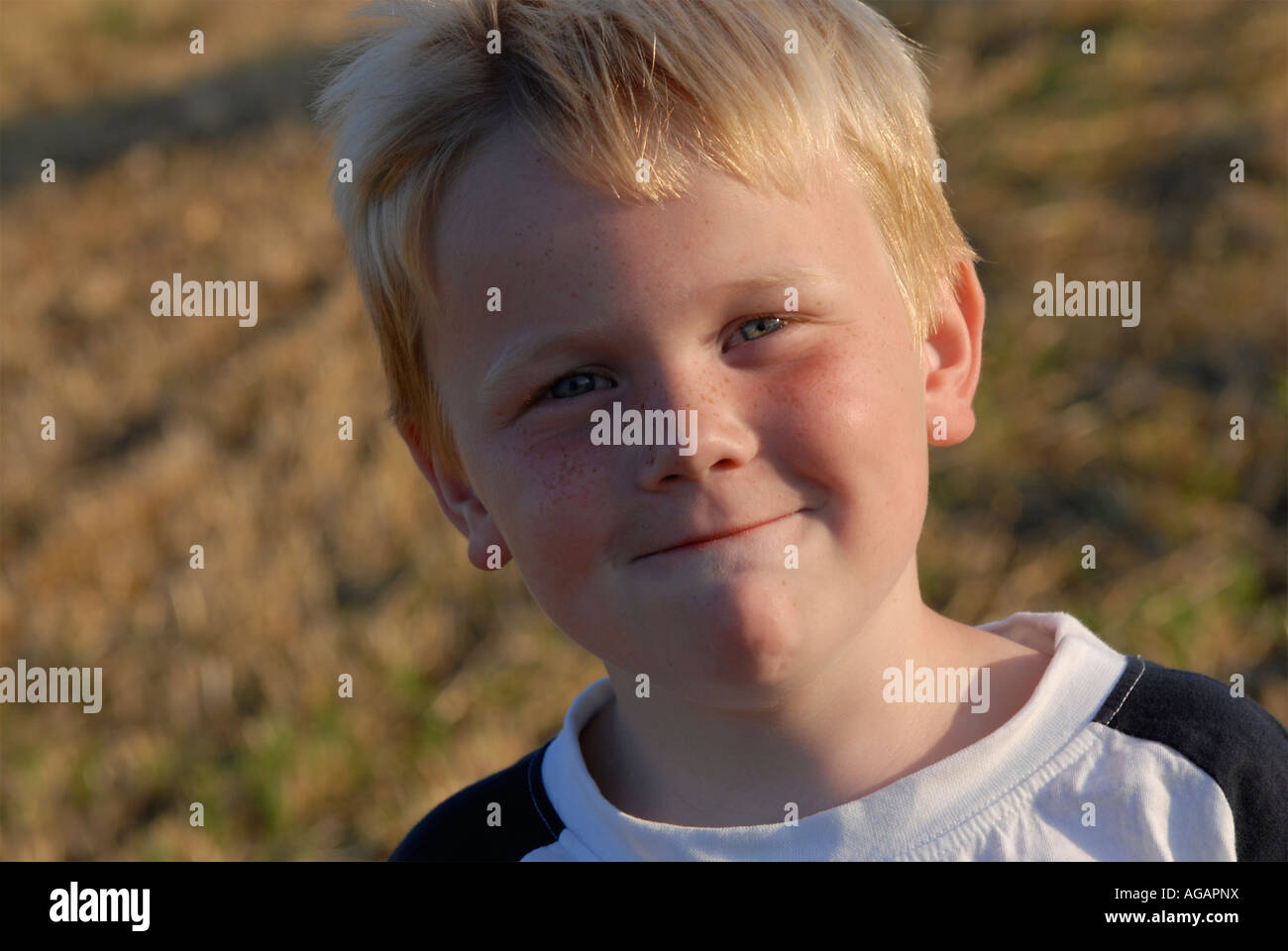 Portrait of a smiling young boy Stock Photo