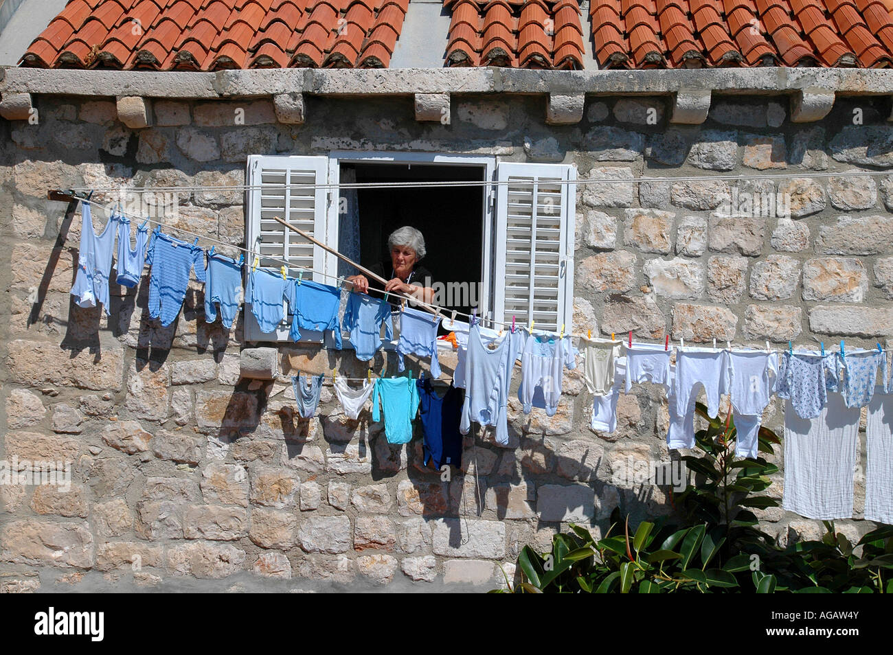 Laundry Hanging out Windows in Dubrovnik Old City Croatia Stock Photo