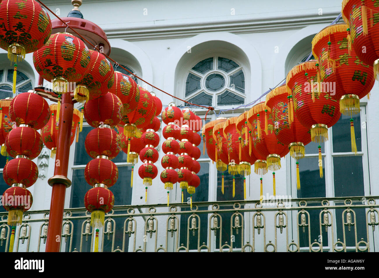 Chinese red lanterns hanging on wires above street in Chinatown London ...