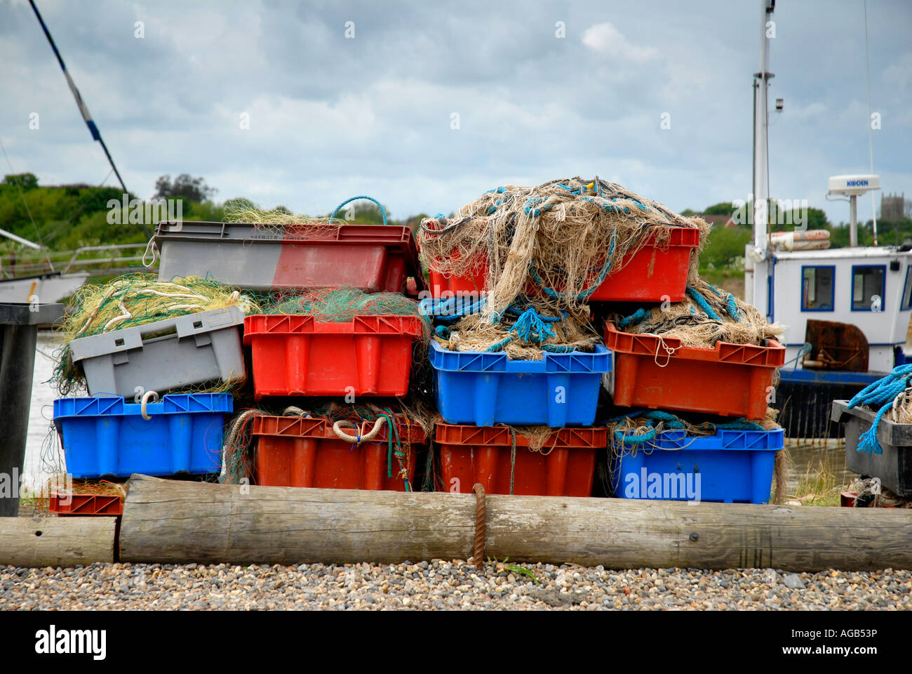Fishing crates after unloading the catch from small boats at Southwold Harbour in Suffolk Stock