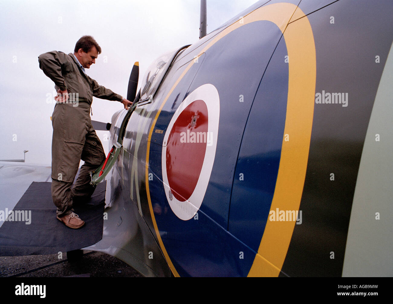 Spitfire pilot standing on the wing. Stock Photo