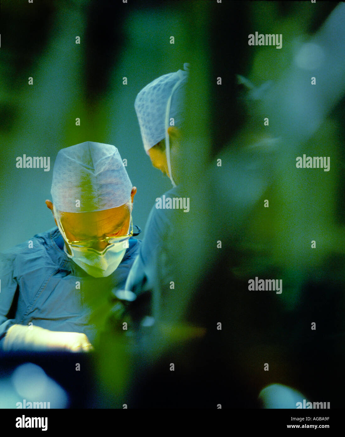 Plastic reconstructive and cosmetic surgery Surgeon concentrates as he