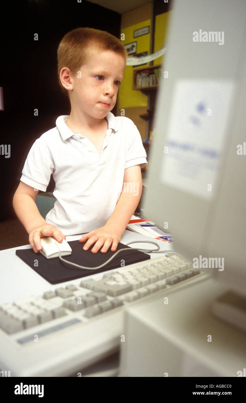 Young child using computer Stock Photo - Alamy