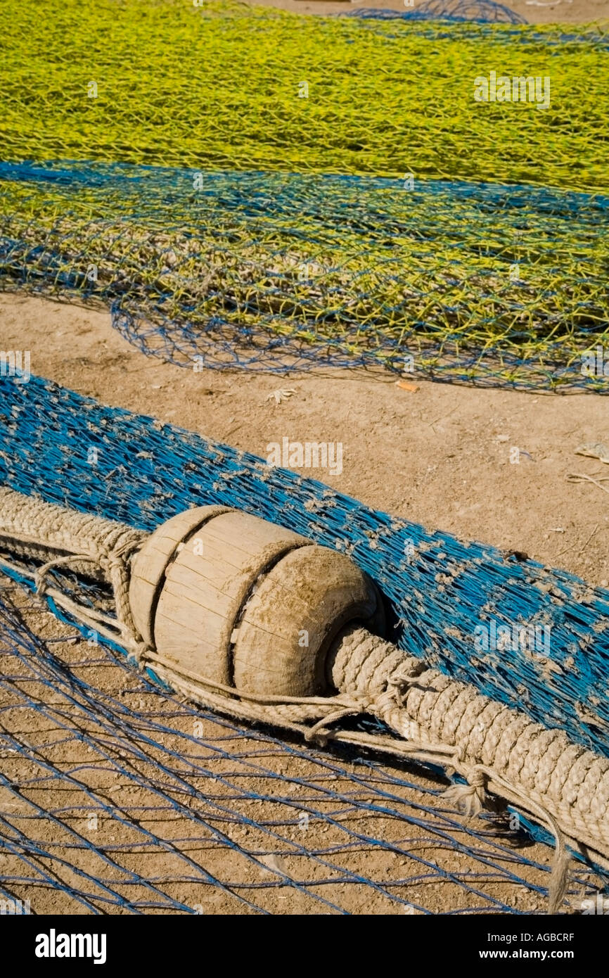 Colored fishing line on the ground in a mediteranean Spanish harbor Stock Photo